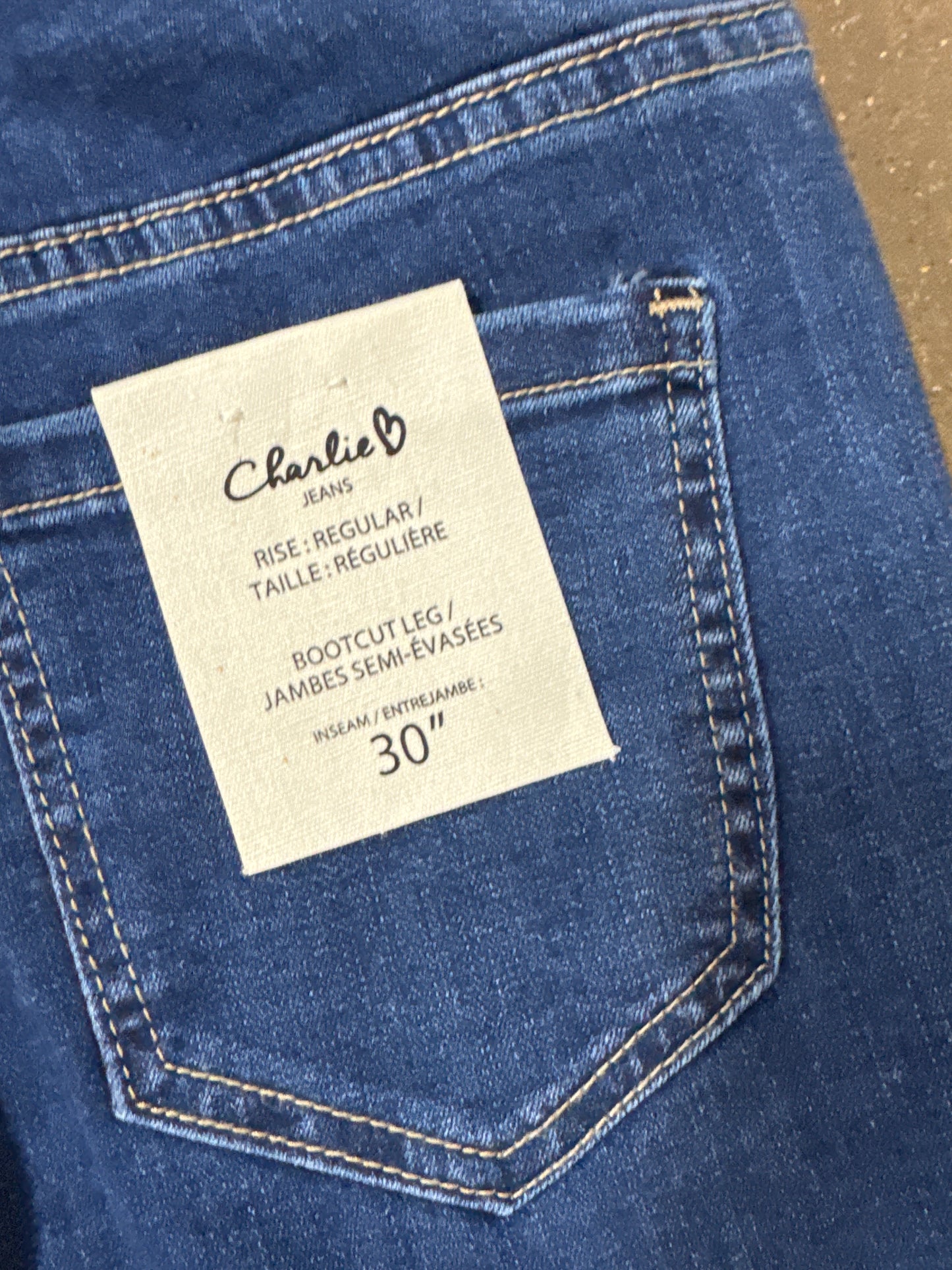 Charlie B bootcut jeans with ombré rhinestone hem