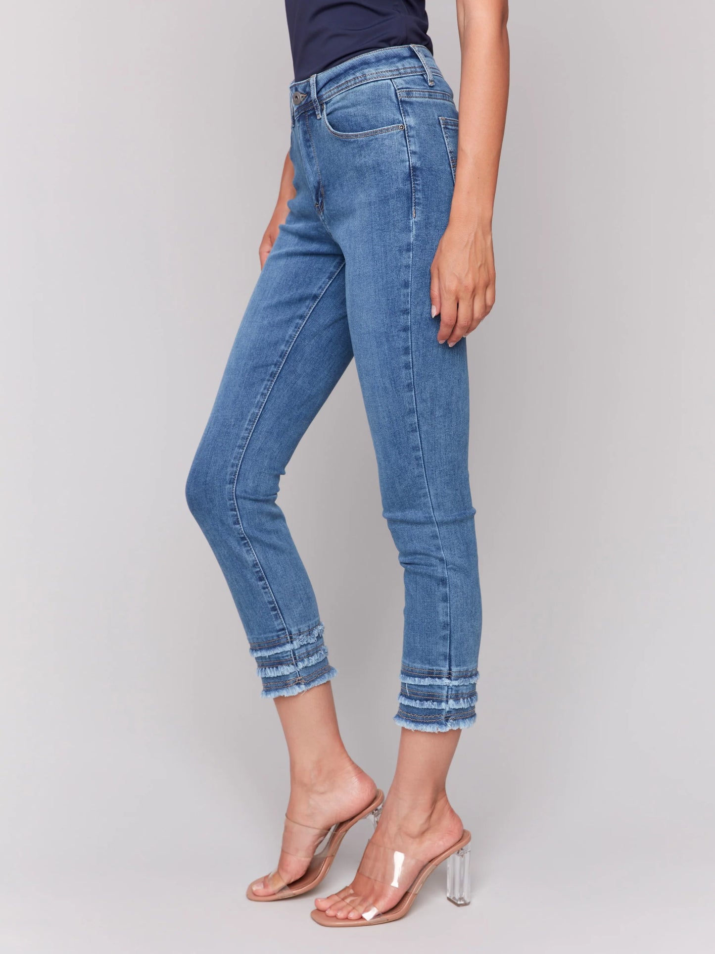 Charlie B Medium Blue Stretch Denim Cropped Skinny Pants With Frayed Hem Details