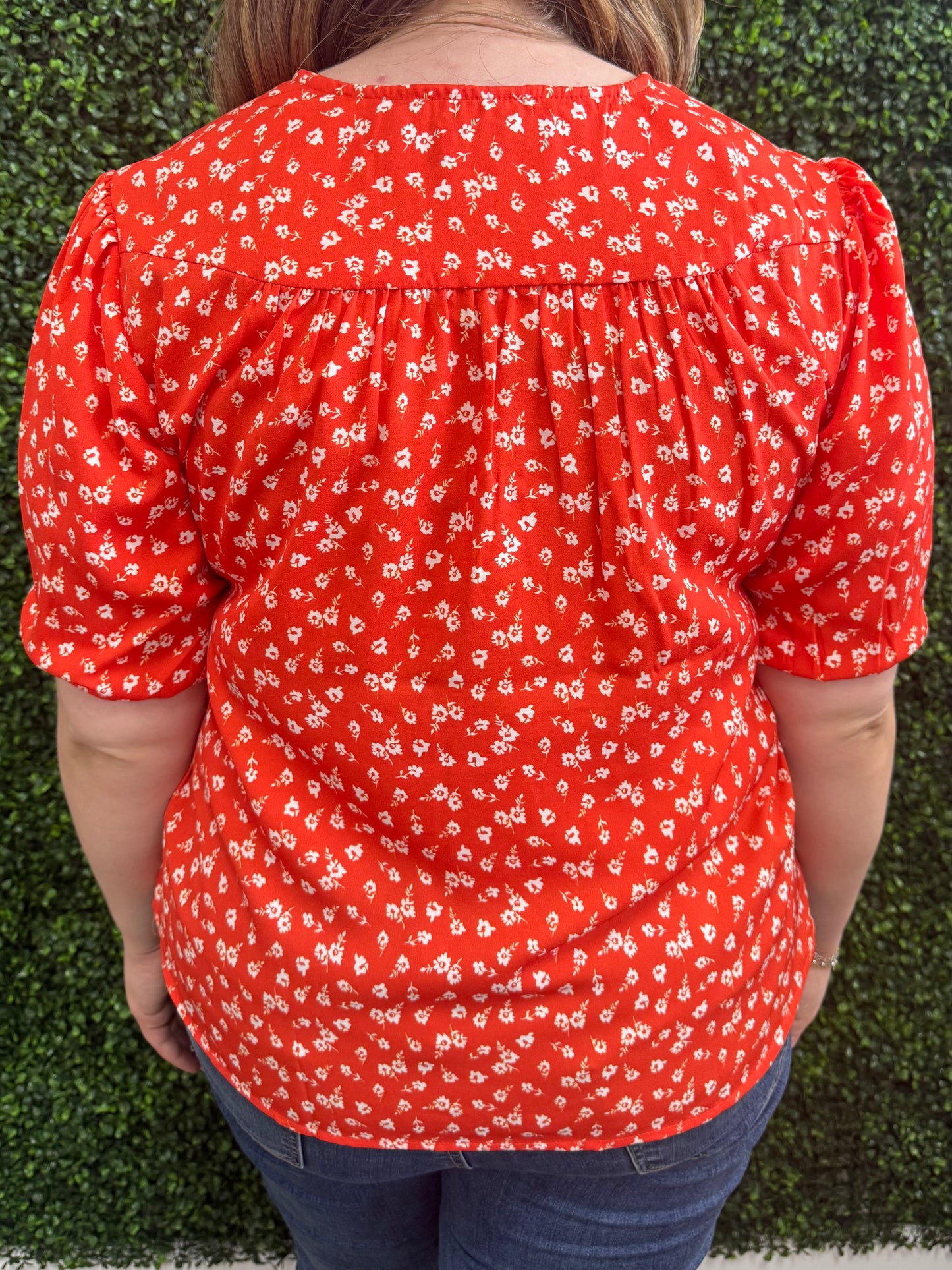 Keren Hart Orange V-neck Top with Floral Print