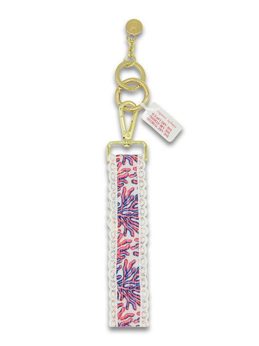 Simply Southern lace key fob wristlet with printed fabric, lace detailing, gold-tone hardware, and Simply Southern logo label.