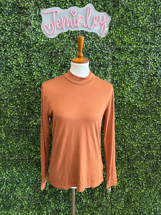 Keren Hart Spice Mock Neck Layering Top styled with fall layers, perfect for fall fashion, modest church outfits for fall, Thanksgiving outfit ideas, pumpkin patch outfits, and fall family photo outfits.
