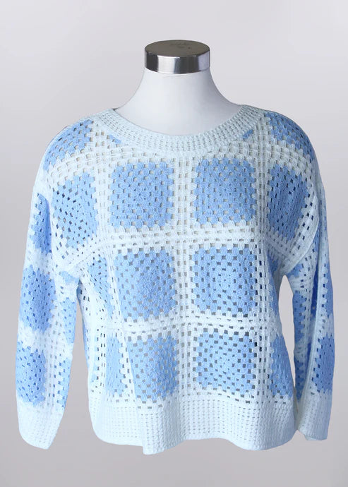 Blue and white crochet-style sweater with lightweight acrylic knit, soft textured design, suitable for spring, church, brunch, and everyday wear
