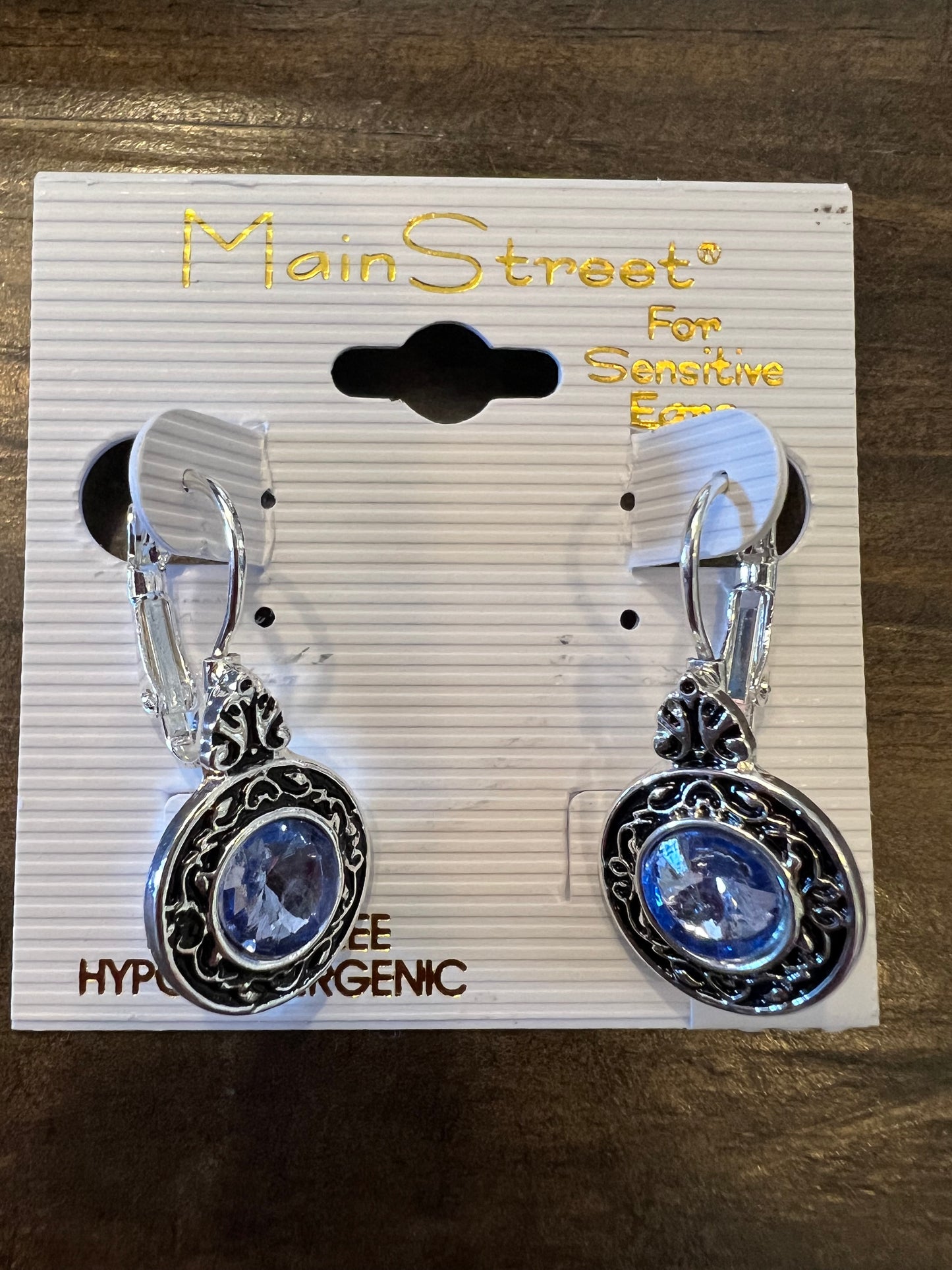 Dangle silver earrings with blue stones