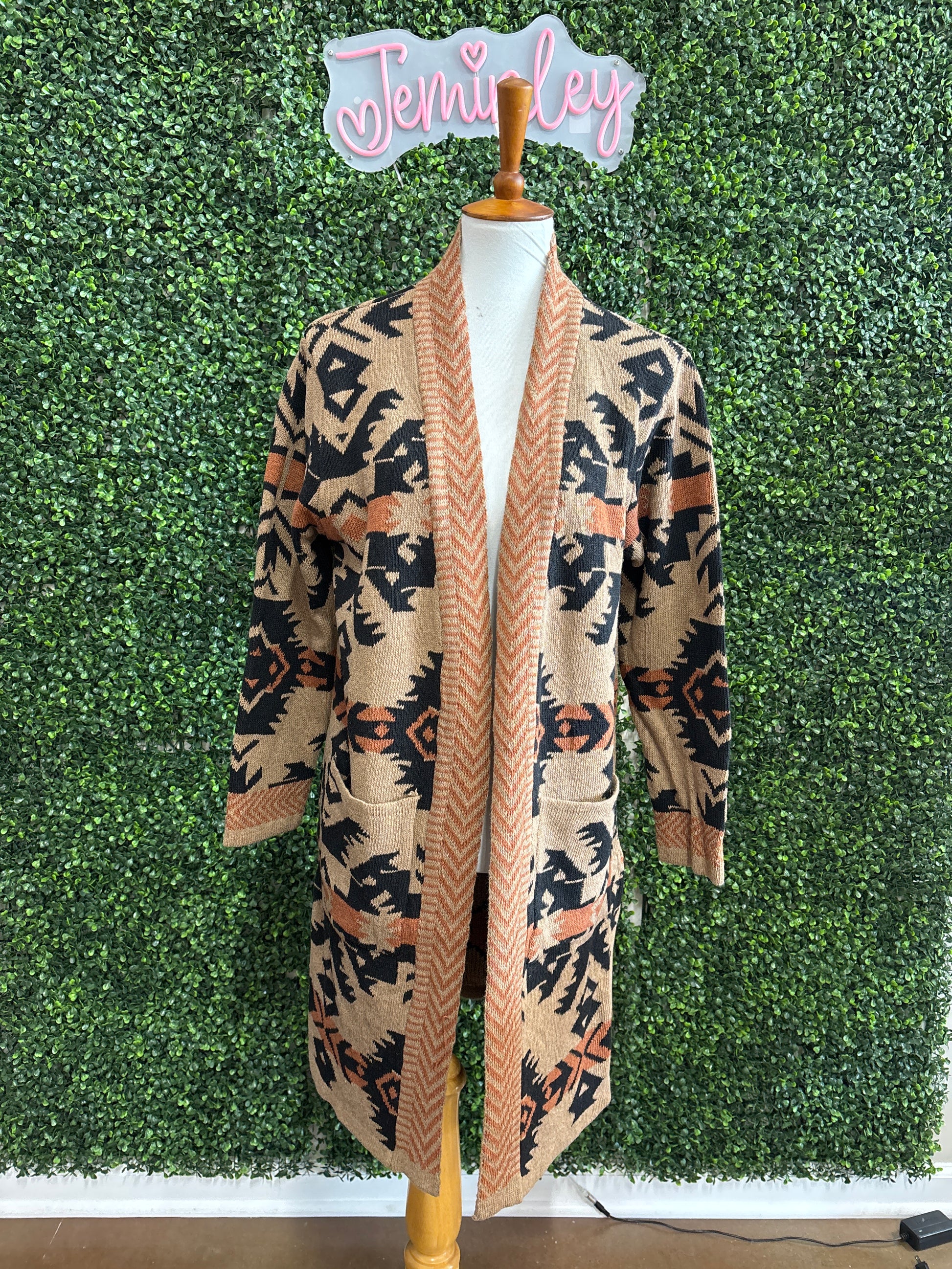Keren Hart Long Fall Aztec Cardigan styled with jeans and boots for fall fashion, modest church outfits for fall, Thanksgiving outfit ideas, pumpkin patch outfits, and fall family photo outfits.