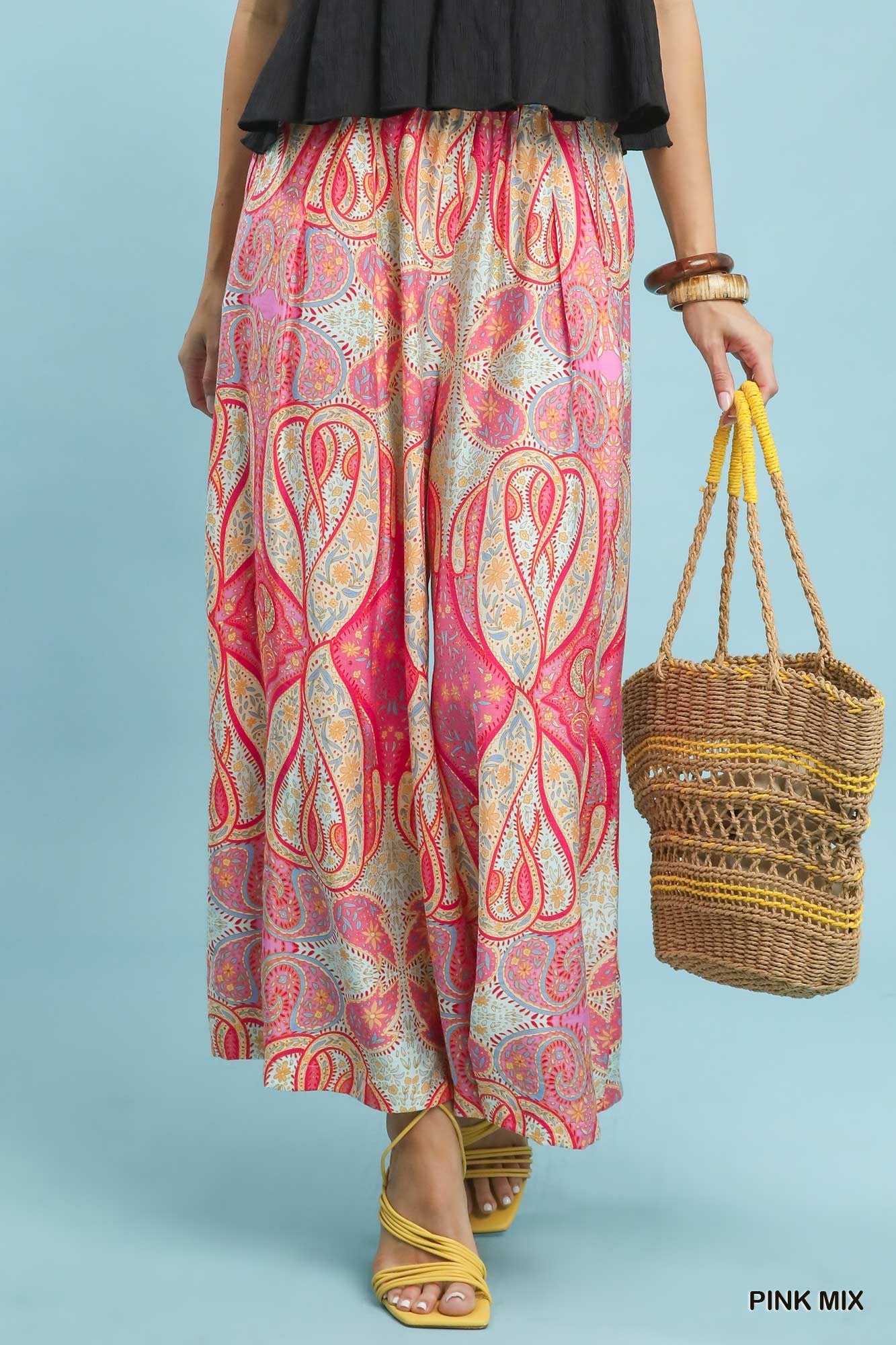 Front view of Umgee Pink Printed Pull-On Skirt Pants with elastic waistband and flowy wide-leg silhouette, lightweight woven fabric.