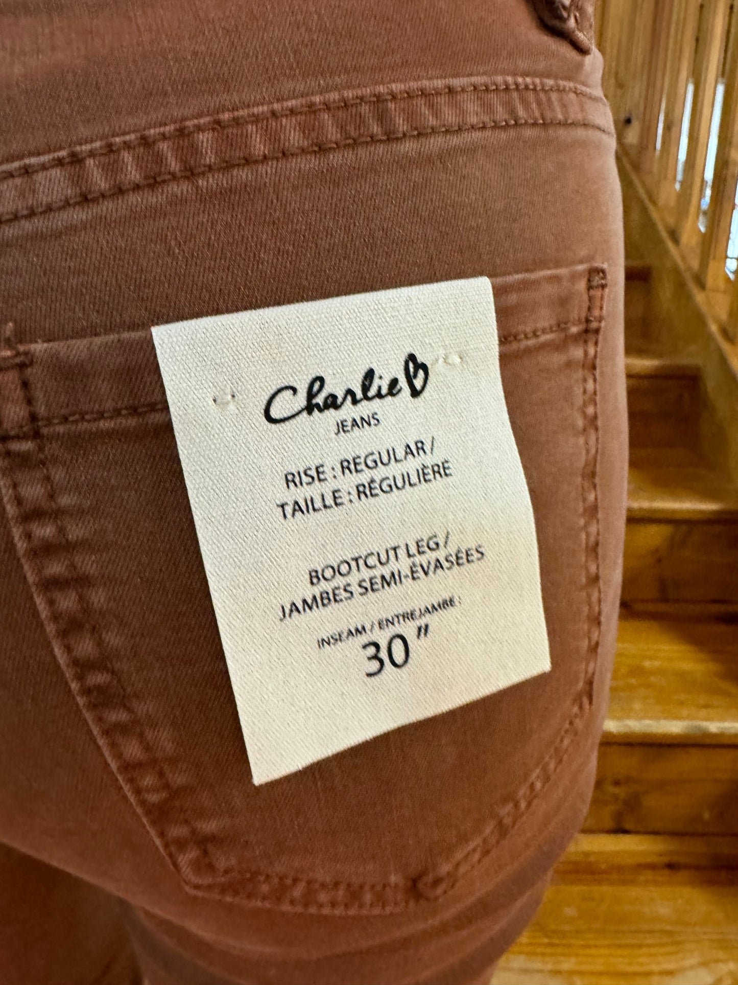 Charlie B Bootcut Jeans with Asymmetrical Hem - Terracotta