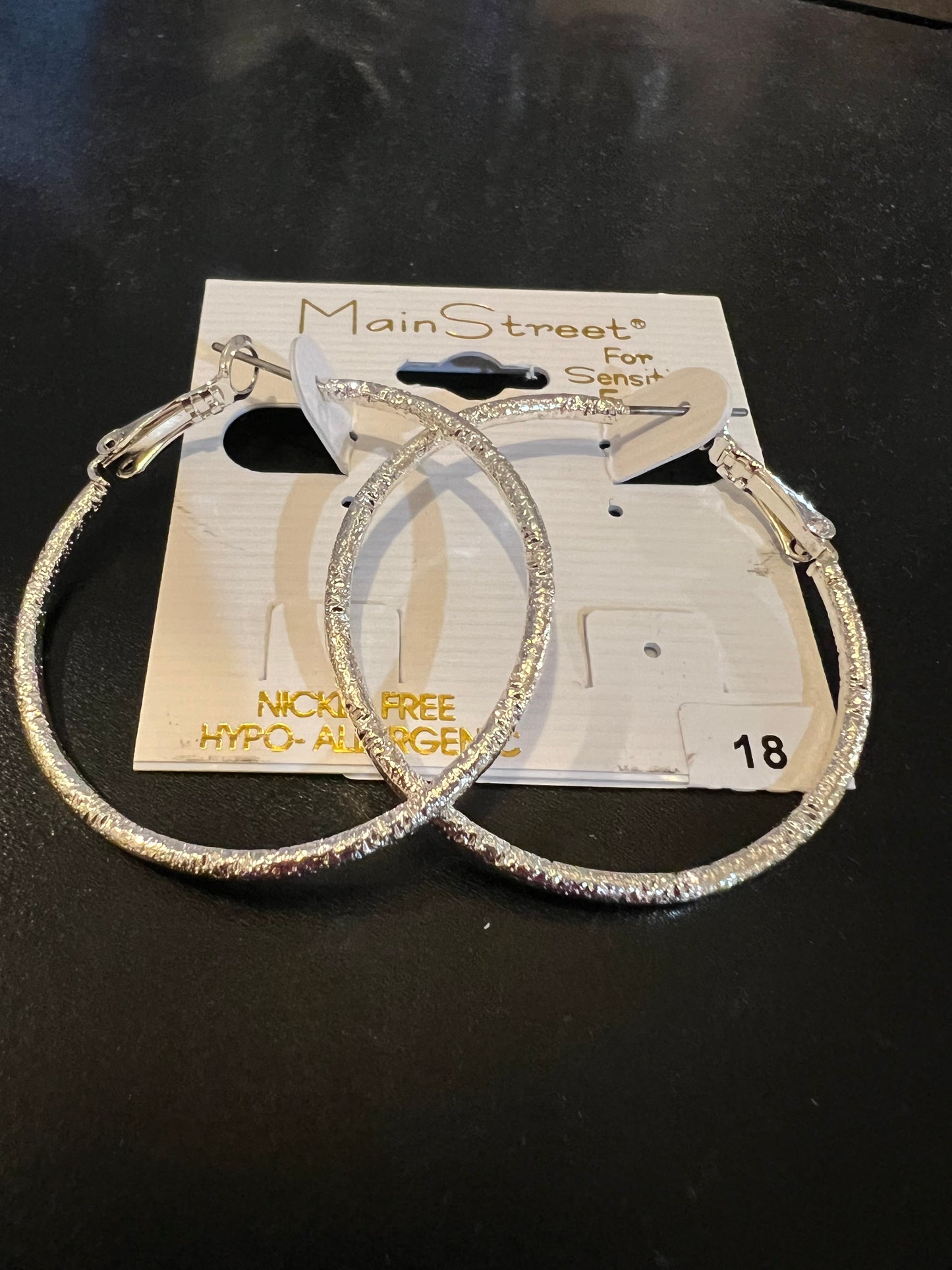 Large silver hoops with detail #18