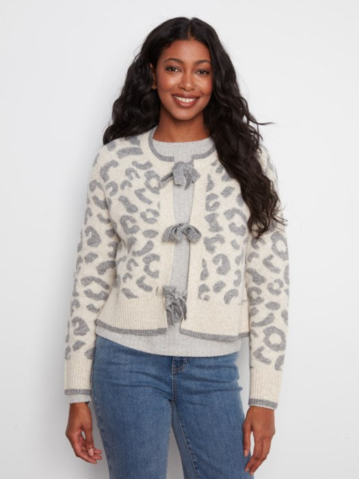 Women's jacquard sweater cardigan with long sleeves and bow tie front