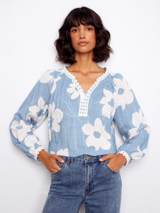 Charlie B Waterlily floral linen blend raglan blouse highlighting airy fabric and crochet trim, great for layering for church, vacation, or outdoor events