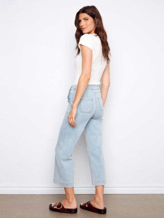 Back view of Charlie B cropped wide leg jeans showing side button details, ideal for vacation or weekend brunch