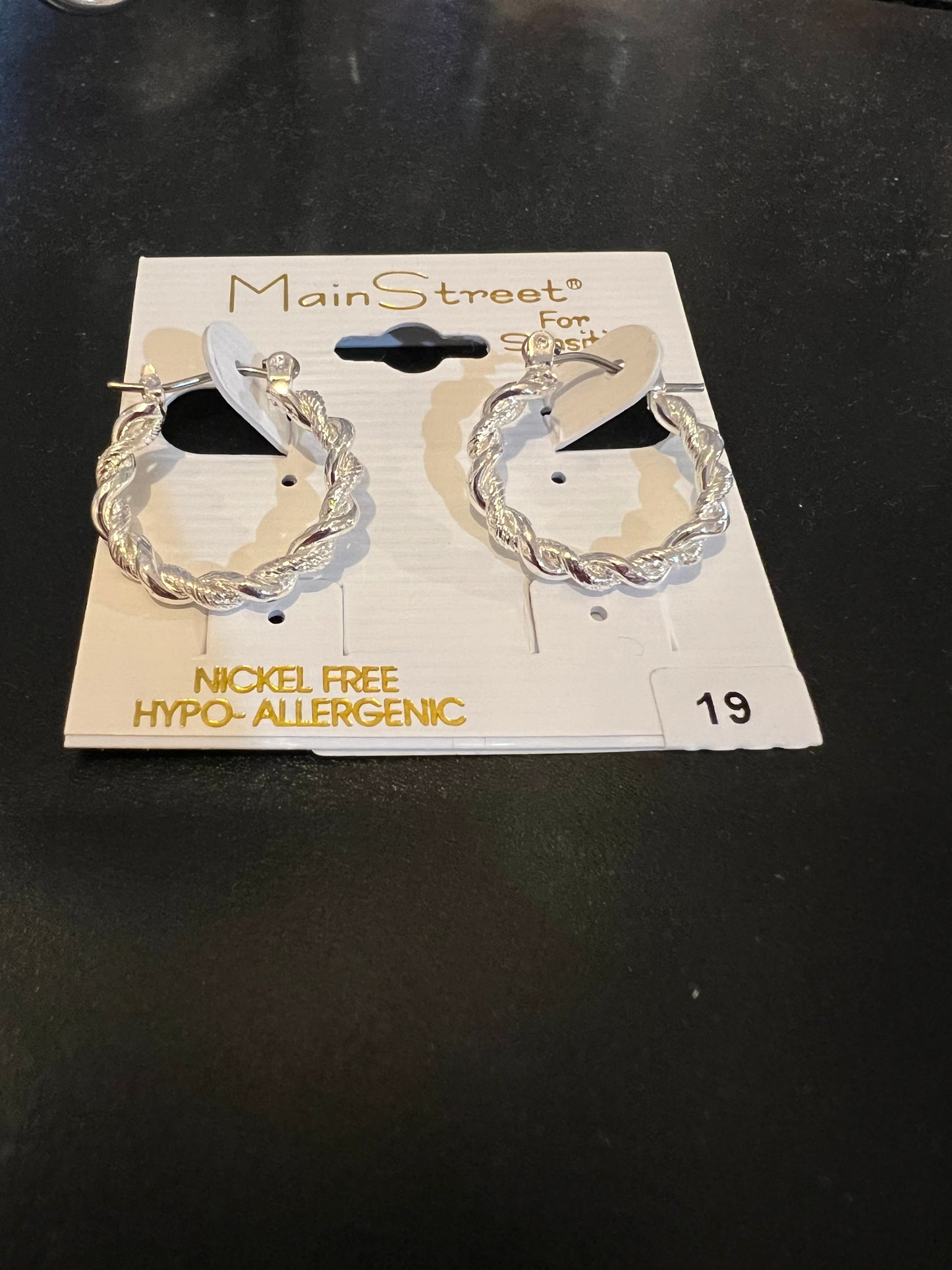 Small silver hoops with detail #19