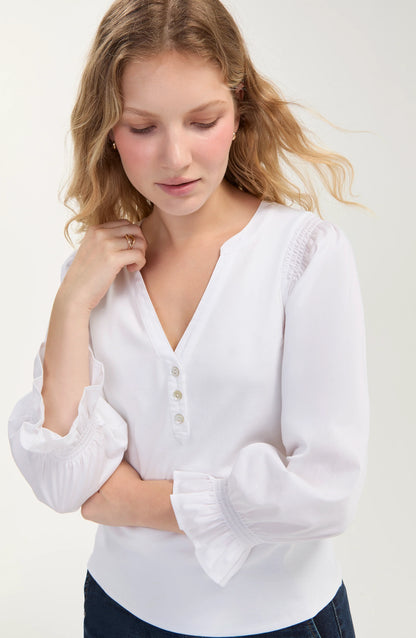 Liverpool Women's knit-to-woven boutique top with 3/4 sleeves, split scoop neckline, three-button detail, and elastic sleeve cuffs.