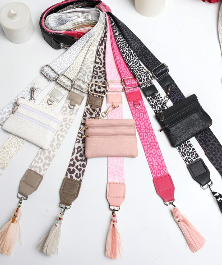 Clip & Go crossbody phone strap with zippered wallet featuring an adjustable strap, weather-resistant design, and secure phone attachment.