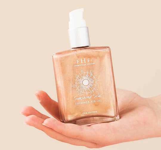 FarmHouse Fresh Sunshine Silk Shimmer Body Oil with rose gold illumination for glowing skin
