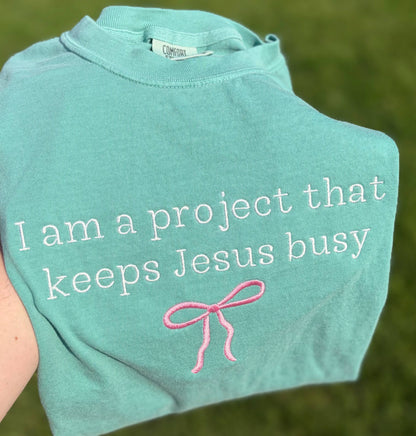 I Am A Project That Keeps Jesus Busy Embroidered CC T-Shirt